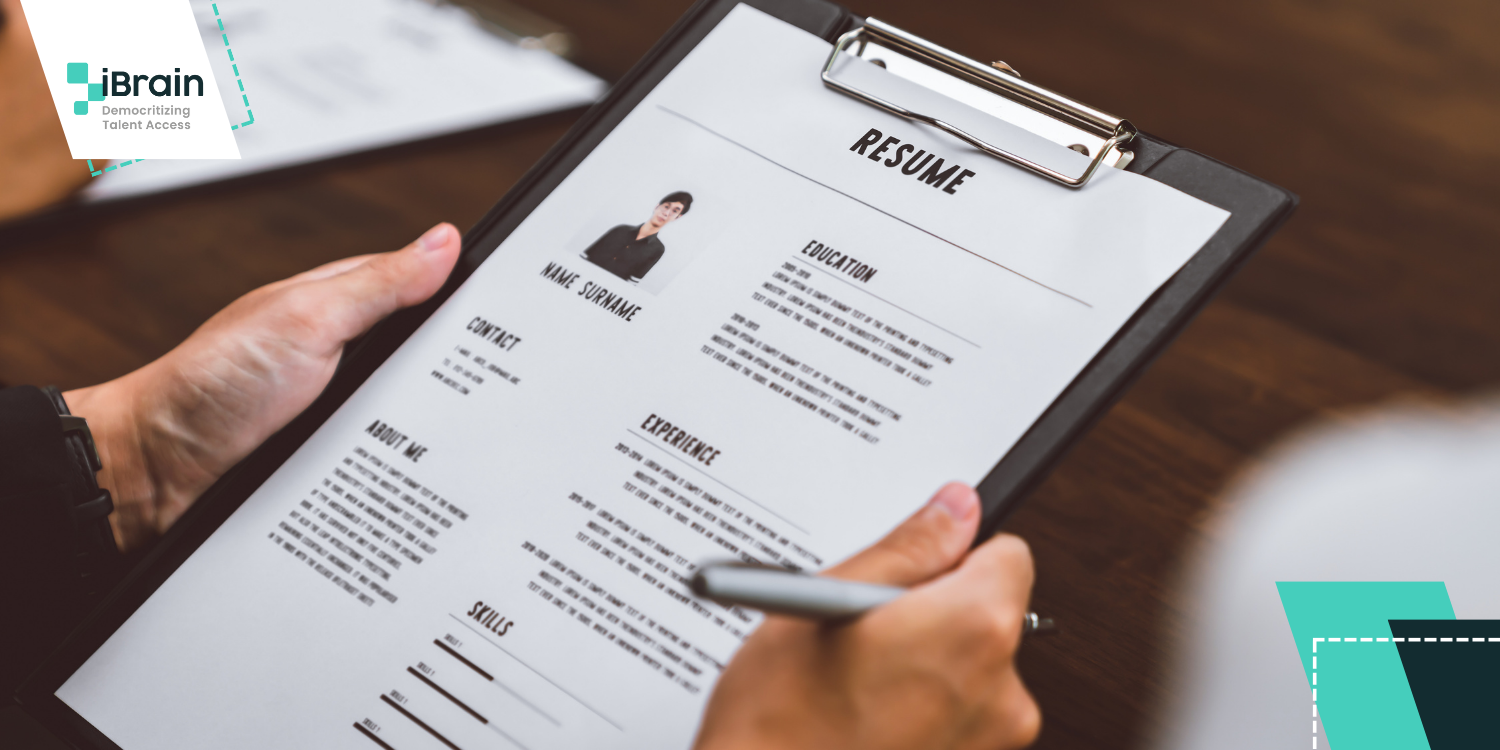 Someone holding a resume